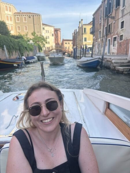 Kristine on a boat in Venice
